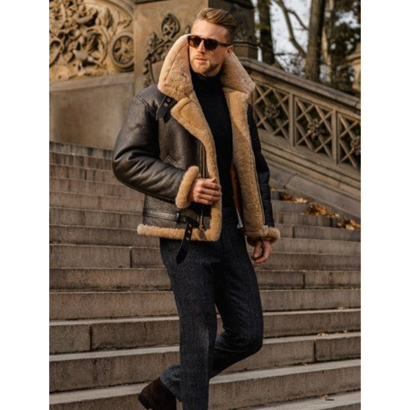 Man in a brown aviator jacket walking outdoors