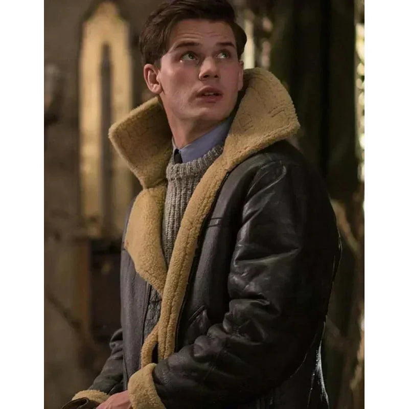 Close-up of a man in a brown aviator jacket with plush collar