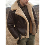 Man wearing a brown aviator jacket over a sweater