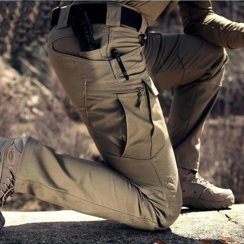 Close-up of the side cargo pocket on khaki trousers