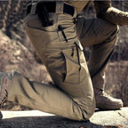 Close-up of the side cargo pocket on khaki trousers