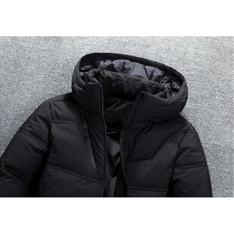 Close-up of the black quilted puffer jacket fabric