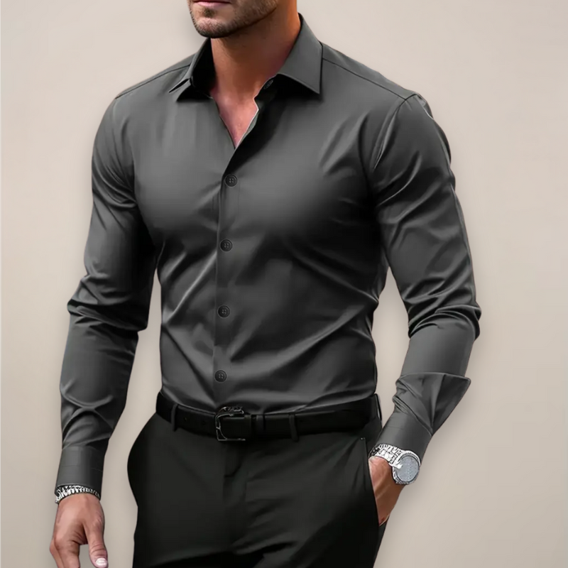 Man wearing a dark gray slim fit long sleeve shirt