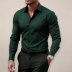 Man wearing a dark green slim fit shirt