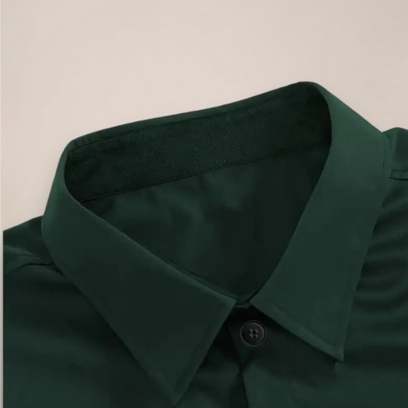 Close-up of the collar on the dark green shirt