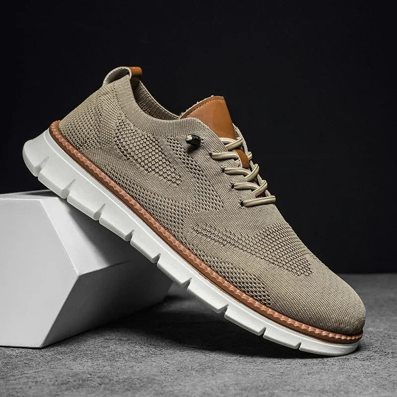 Men's beige textured lace-up shoe with white sole, side view