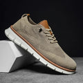 Men's beige textured lace-up shoe with white sole, side view