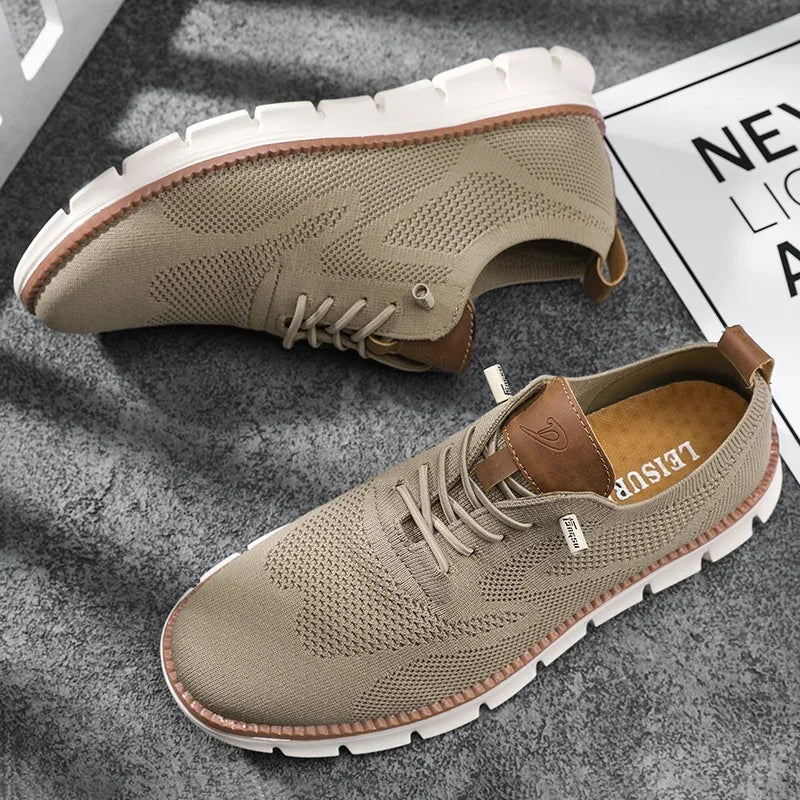 Close-up of the beige lace-up shoe showing the textured upper and sole