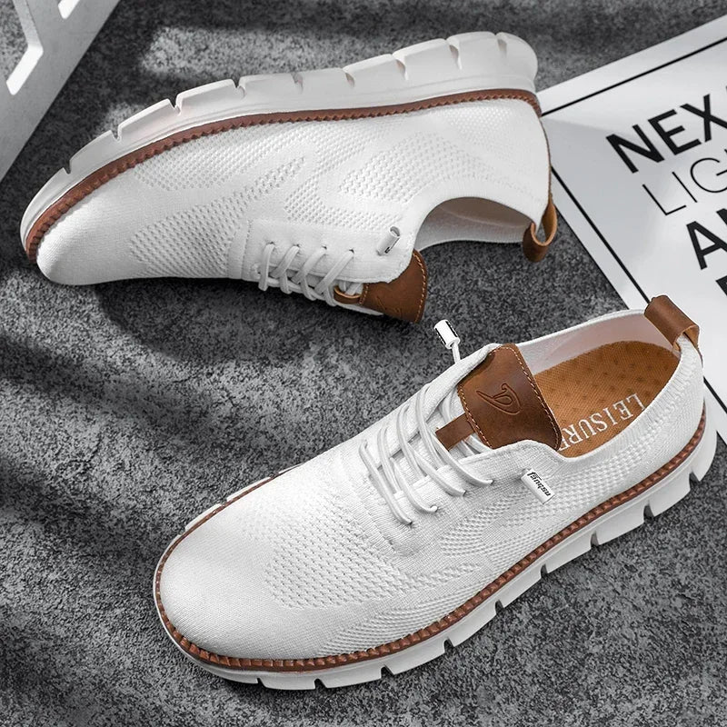 Pair of white men's lace-up casual shoes
