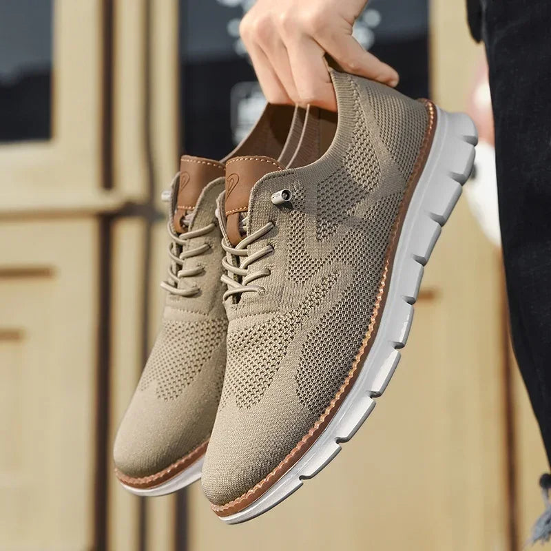 Beige lace-up shoes worn with light jeans