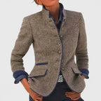 Woman in a caramel button front knit blazer cardigan
