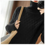 Women's cable knit turtleneck sweater in black – front view