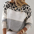 Gray color block leopard knit sweater worn with jeans