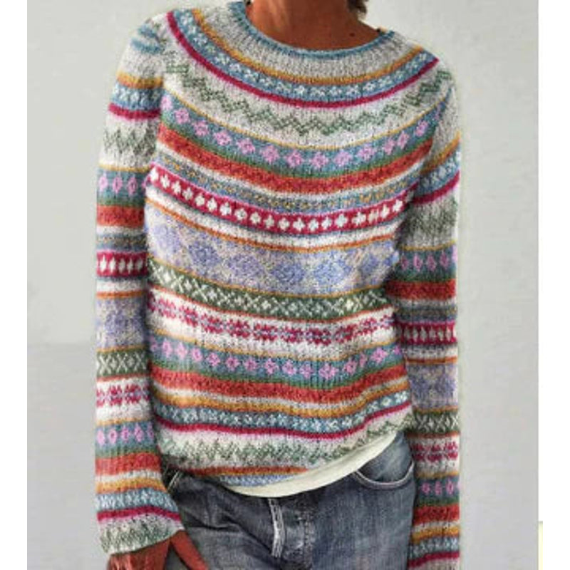 Woman wearing a red, white and orange striped Fair Isle sweater