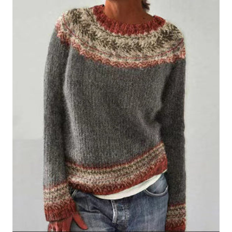 Woman in a gray patterned Fair Isle sweater