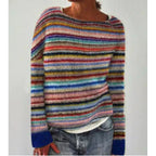 Woman wearing a rainbow striped Fair Isle crew neck sweater