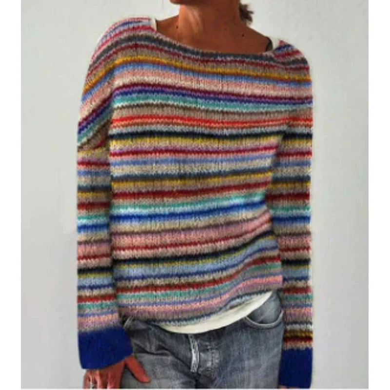 Woman wearing a rainbow striped Fair Isle crew neck sweater