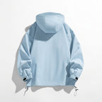 Light blue women's hooded outdoor jacket, back view