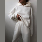 Women's hooded sweatshirt and jogger set in white – front view