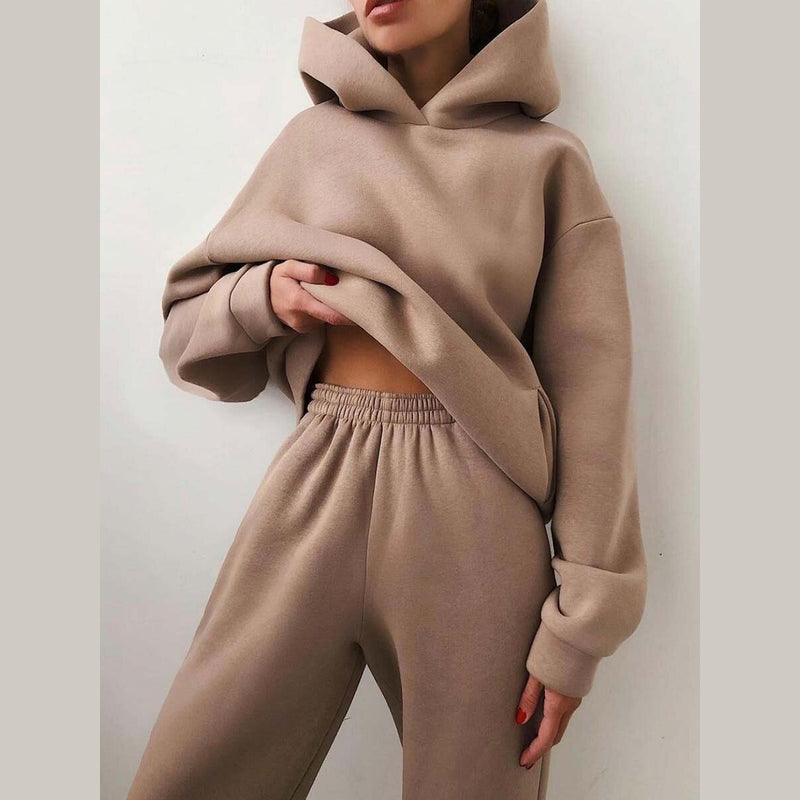 Women's hooded sweatshirt and jogger set in brown – front view