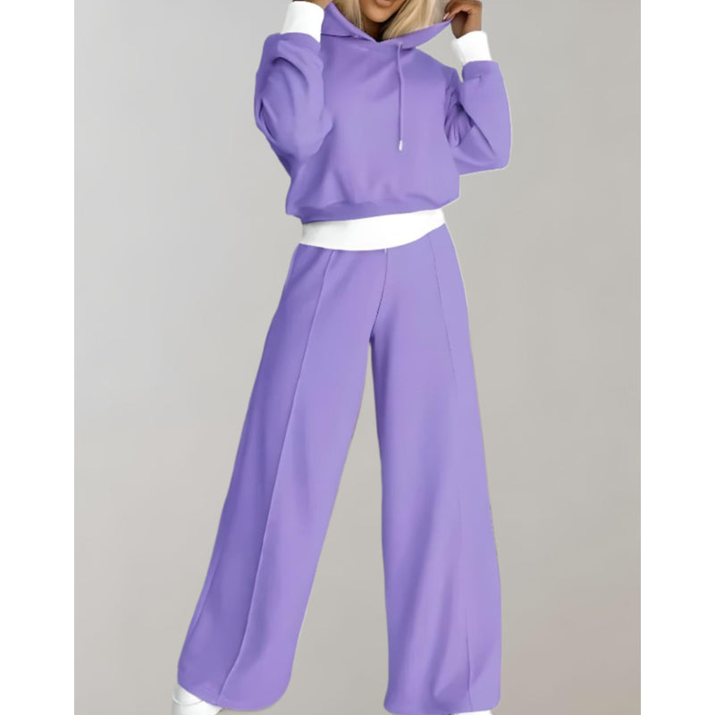 Woman in a purple hoodie and jogger set