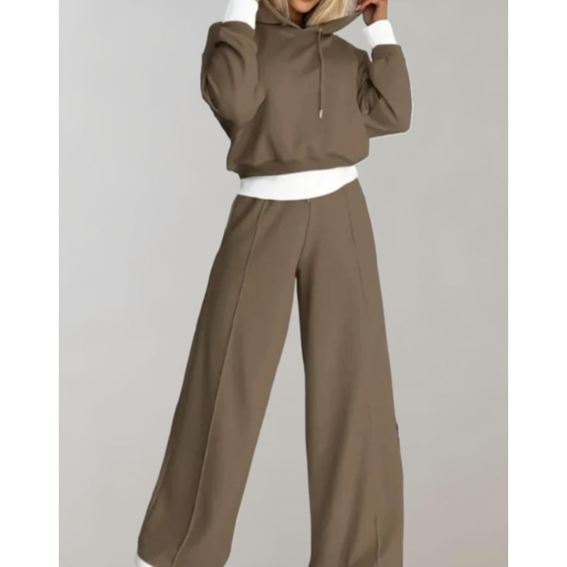 Woman wearing a brown hoodie and jogger set