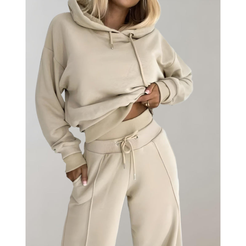 Woman in a beige hoodie and jogger set