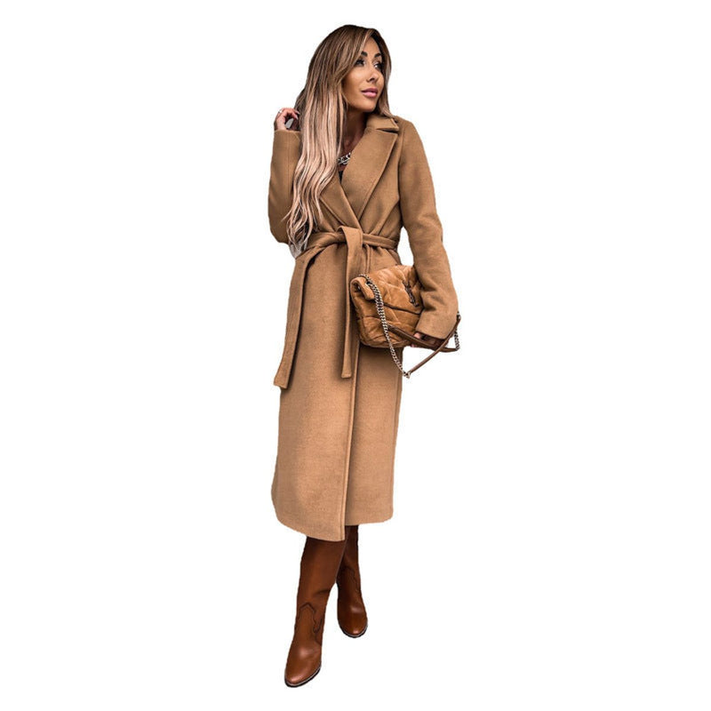 Women's long belted coat with lapel collar in camel – front view