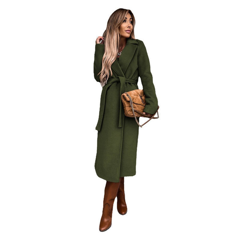 Women's long belted coat with lapel collar in olive green – front view