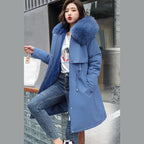 Women's long parka with faux fur hood in blue – front view
