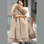 Women's long parka with faux fur hood in beige – front view