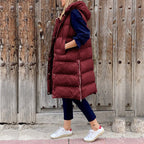 Women's long quilted hooded vest in burgundy – front view