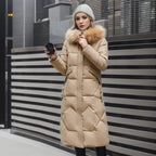 Woman in a khaki long quilted puffer coat with plush hood