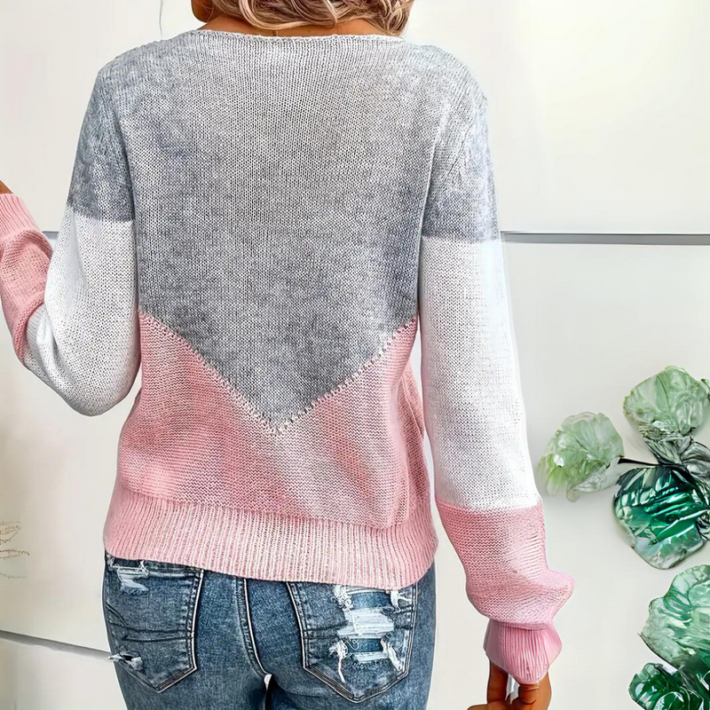Close-up of the pink and gray loose fit sweater