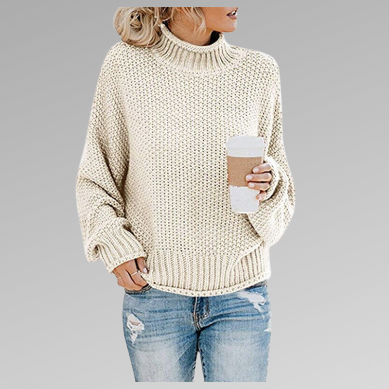 Woman in a white loose knit sweater