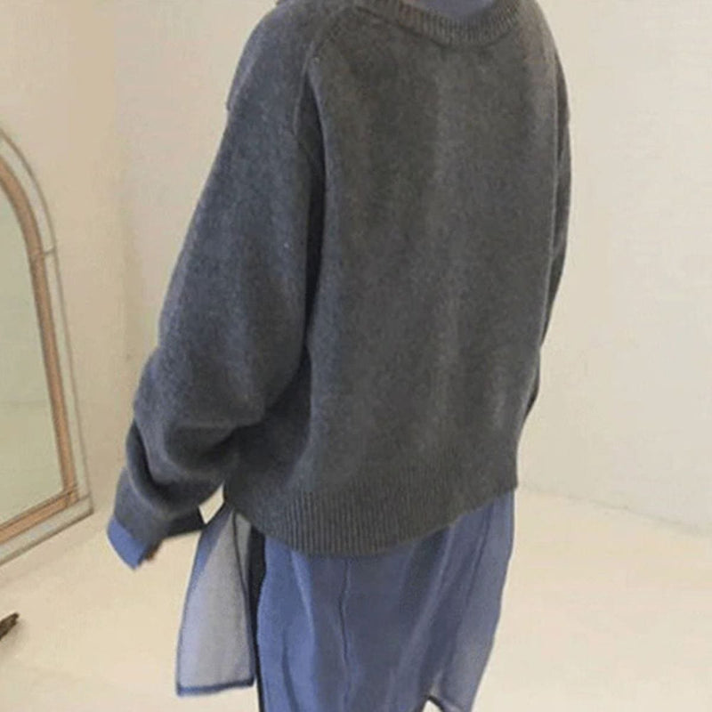 Women's oversized cardigan with asymmetric buttons – styled view 3