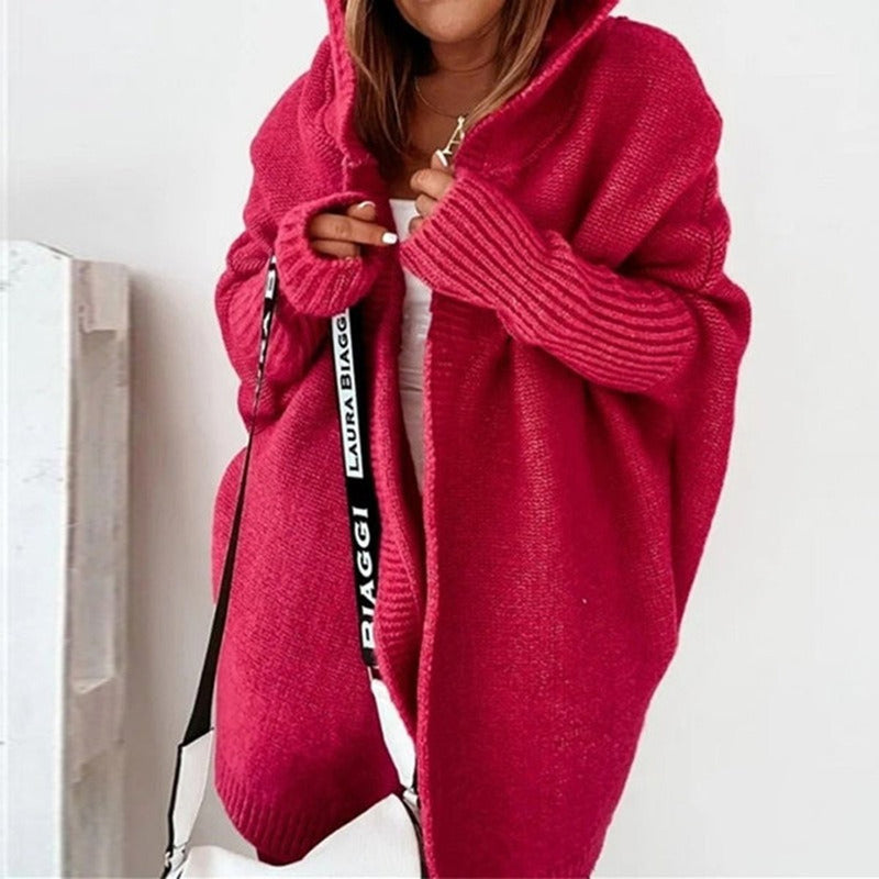 Women's oversized hooded cardigan with batwing sleeves in red – front view