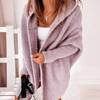 Women's oversized hooded cardigan with batwing sleeves in lilac – front view
