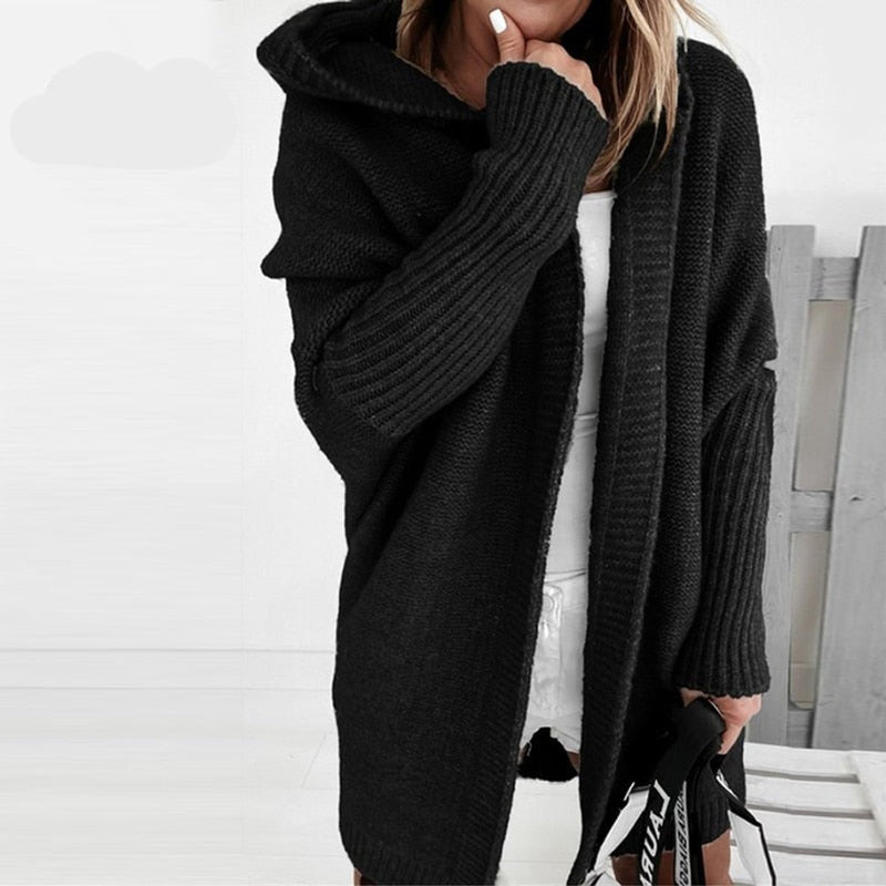 Women's oversized hooded cardigan with batwing sleeves in black – front view