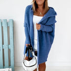 Women's oversized hooded cardigan with batwing sleeves in blue – front view