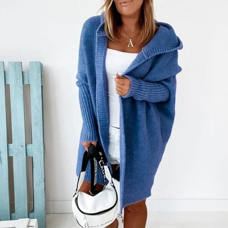 Women's oversized hooded cardigan with batwing sleeves in blue – front view