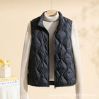 Women's quilted vest with stand collar in black – front view