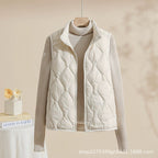 Women's quilted vest with stand collar in cream – front view