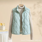 Women's quilted vest with stand collar in mint green – front view