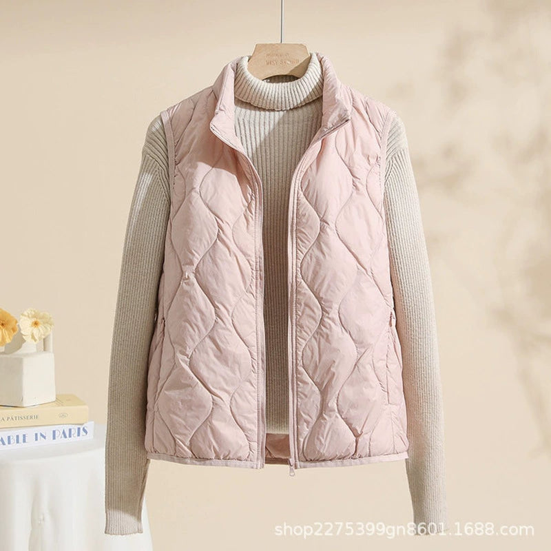 Women's quilted vest with stand collar in pink – front view