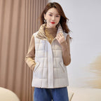 Women's quilted zip vest with high collar in off white – front view