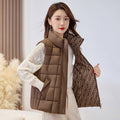 Women's quilted zip vest with high collar in coffee – front view
