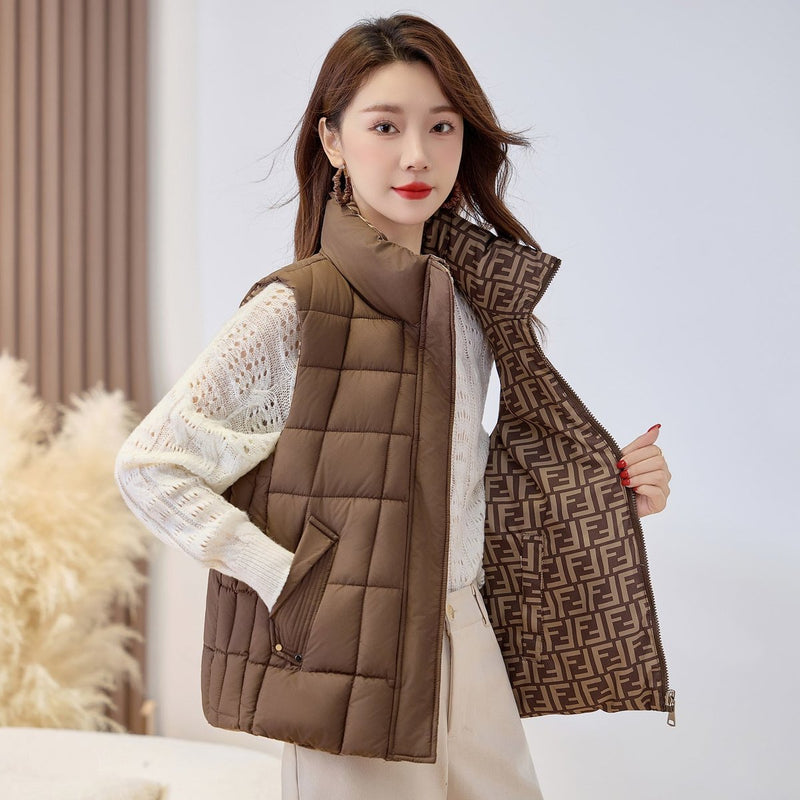Women's quilted zip vest with high collar in coffee – front view