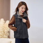 Women's quilted zip vest with high collar in black – front view