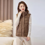 Women's quilted zip vest with high collar – styled view 7
